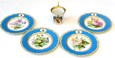 Lot 80 - A set of four French dessert plates, circa 1850, painted with flowersprays within blue borders with