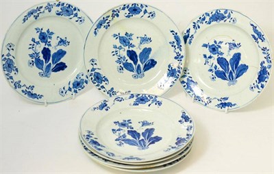 Lot 81 - A set of seven bow porcelain plates, circa 1765, painted underglaze blue with flower sprays,...