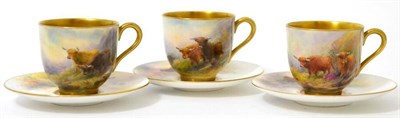 Lot 84 - A set of three Royal Worcester porcelain coffee cups and saucers painted by Harry Stinton,...