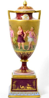 Lot 107 - A Vienna style porcelain urn shaped vase, cover and stand circa 1900, decorated with dancing...