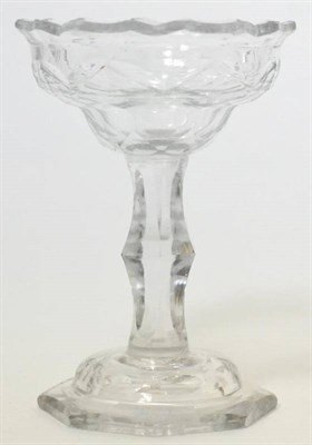 Lot 162 - A sweetmeat glass circa 1770, the faceted ogee shaped bowl on a knot stem and domed foot, 14cm high