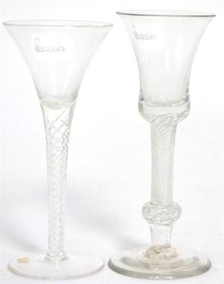 Lot 165 - A wine glass, circa 1750, the bell shaped bowl on an air twist stem and basal knop, 17cm high;...