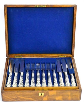 Lot 184 - A set of eighteen pairs of silver handled Queen's pattern fruit knives and forks, Roberts & Slater