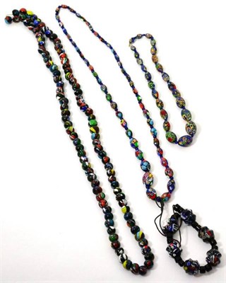 Lot 190 - A collection of Millefiori and other colour glass beads on four strings