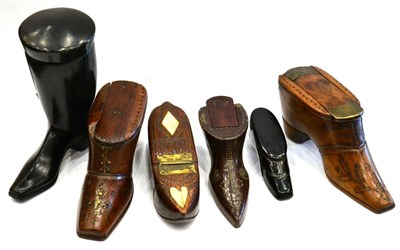 Lot 192 - A lacquered wood snuff box, 19th century, modelled as a boot, 9cm high; a similar snuff box as...