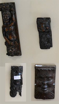 Lot 223 - A carved oak panel, possibly English, 16th century, as the Green Man within carved leaves, 22cm...