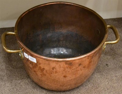 Lot 237 - A twin handled copper deep pan, 19th century, of ovoid form, 47cm wide