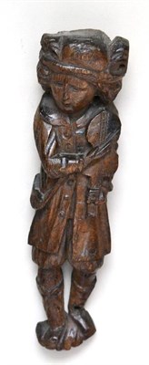 Lot 239 - A Flemish oak figure of a musician, 17th century, standing holding a violin, 31.5cm high