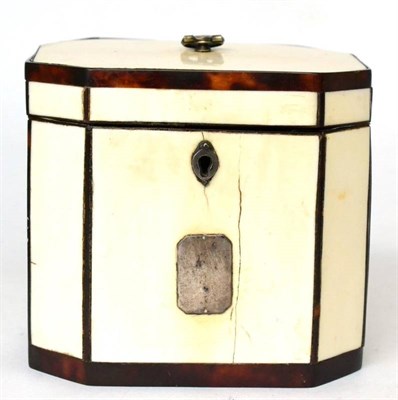 Lot 241 - A George III tortoiseshell banded ivory tea caddy of canted rectangular form, the front set...