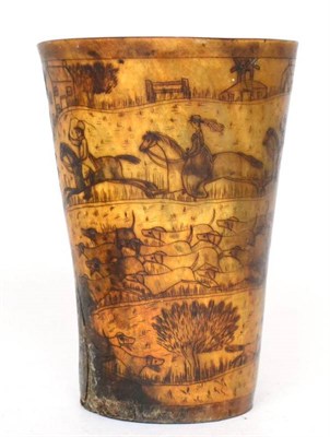 Lot 247 - A horn beaker, 19th century, decorated with a hunting scene, 14.5cm high