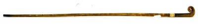 Lot 248 - A horn crop, circa 1900, the yellow metal collar engraved with foliage, unmarked, 78cm long