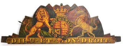 Lot 261 - A painted and gilt wood display board, circa 1880, painted with the arms of Queen Victoria over the