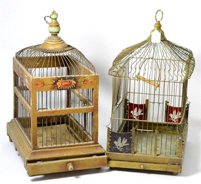 Lot 262 - A painted wood and wirework birdcage, of rectangular form with turned handle and drawer to...