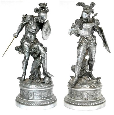 Lot 269 - A pair of cast alloy figures of medieval warriors on drum bases, 51cm high