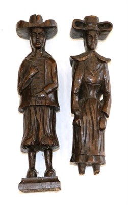 Lot 273 - A pair of Dutch carved oak figures of a lady and gentleman, 17th century, standing wearing...