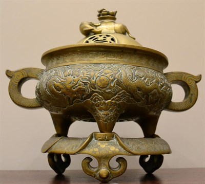 Lot 284 - A 19th century Chinese bronze Koro, cover and stand