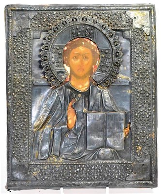 Lot 290 - A Russian icon depicting Christ Pantocrator with silver oklad, 27cm by 22cm