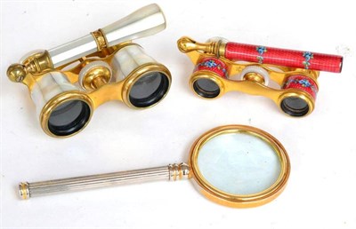 Lot 295 - ^ A set of mother-of-pearl mounted gilt metal opera glasses, early 20th century, with eyepieces...