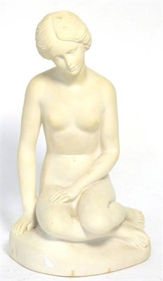 Lot 311 - A white marble figure of a girl, 20th century, sitting on a mound base, incised 1054, 27cm high