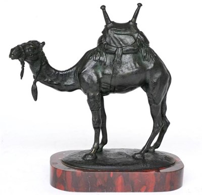 Lot 313 - After Antoine Louis Barye, a bronze model of a camel standing a saddle on its back, signed,...