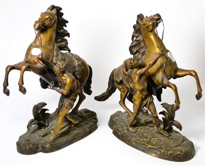 Lot 315 - After Guillame Cousteau: a pair of bronze Marly horses, 39cm high