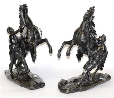 Lot 316 - After Guillaume Coustou (French 1677-1746) a pair of bronze models of the Marly horses on...