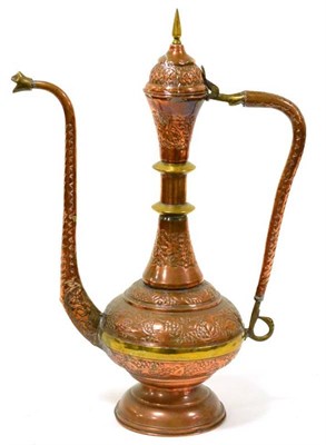 Lot 326 - An Islamic copper and brass coffee pot and cover, late 19th/early 20th century, of knopped baluster