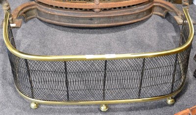 Lot 407 - A Victorian brass and wirework fender, on ball feet, 79cm wide