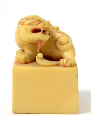 Lot 423 - A Chinese ivory seal, 19th century, carved with a kylin, 5cm high