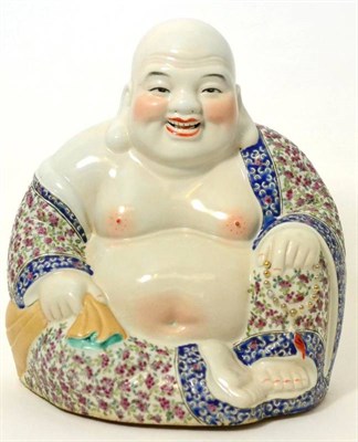 Lot 435 - A Chinese porcelain figure of a seated Buddha, printed in famille rose enamels decorated with...