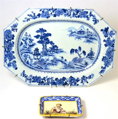 Lot 437 - A Chinese porcelain meat platter, Qianlong, painted in underglaze blue with figures in a river...