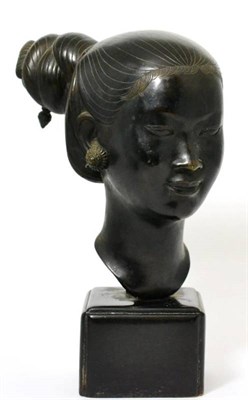 Lot 446 - Nguyen Thanh Le (20th century) Vietnamese bronze bust of a girl, her hair in a knot, signed on...