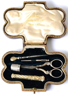 Lot 485 - A French silver-gilt manicure set, maker's mark indistinct, circa 1900, in leatherette box...