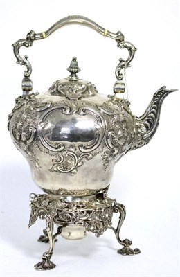 Lot 486 - A George II style silver kettle on stand, with foliate and C scroll chased decoration, the...