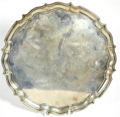 Lot 493 - A George V shaped circular silver tray, Barker Brothers, Birmingham 1932, 31cm diameter, 26.6ozt