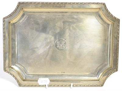 Lot 494 - A George V silver dressing table tray, Walker & Hall Sheffield 1922, rectangular with cut...