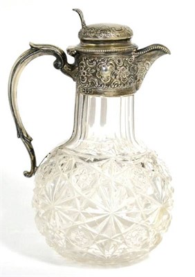 Lot 506 - A late Victorian silver mounted cut glass claret jug, W & G Sissons, London 1900, the mount...