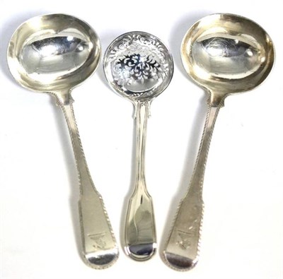 Lot 514 - A pair of George III silver sauce ladles, London 1812, fiddle pattern with feather edge,...