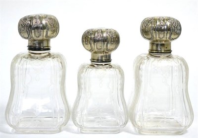 Lot 526 - A set of three French silver mounted glass decanters, Henri LaPeyre, circa 1900, with engraved...