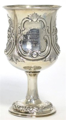 Lot 545 - A Victorian silver goblet, Robert Harper, London 1865, the bowl chased with flowers in reserved...