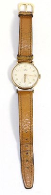 Lot 566 - A 9ct gold wristwatch, signed Smiths, model: Deluxe, 1955, lever movement, silvered dial with...