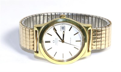 Lot 567 - A gold plated automatic calendar centre seconds wristwatch, signed Omega, Geneve, 1973,...