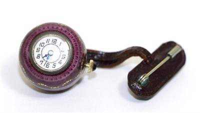 Lot 568 - A guilloche enamel ball watch, circa 1925, lever movement signed Marchand W.Co, silvered dial...