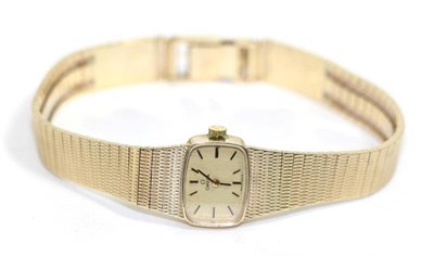 Lot 570 - A lady's 9ct gold wristwatch, signed Omega, 1972, (calibre 485) lever movement signed and...