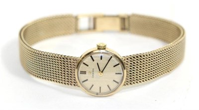 Lot 571 - A lady's 9ct gold wristwatch, signed Omega, 1973, lever movement signed and numbered 35264690,...