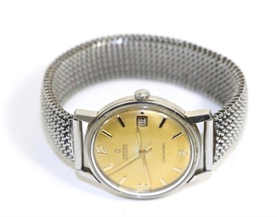 Lot 574 - A stainless steel automatic calendar centre seconds wristwatch, signed Omega, model: Seamaster,...