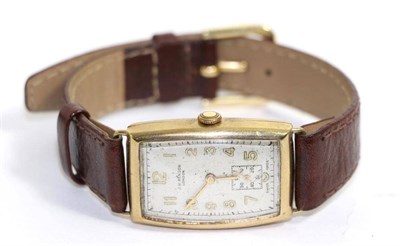 Lot 584 - &lt; An 9ct gold wristwatch, signed J.W. Benson, 1951, lever movement signed, silvered dial...