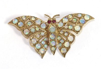 Lot 589 - A 9 carat gold opal butterfly brooch, with ruby set eyes and wings and body set throughout with...