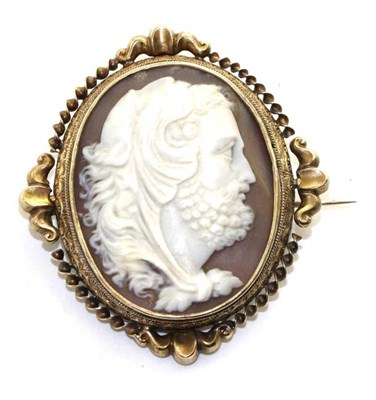 Lot 591 - A cameo brooch, carved depicting the bust of Hercules, in a gilt scroll frame with glazed...