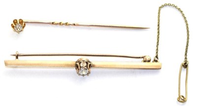 Lot 608 - A diamond bar brooch, an old cut diamond in a claw setting to a knife edge bar, estimated...